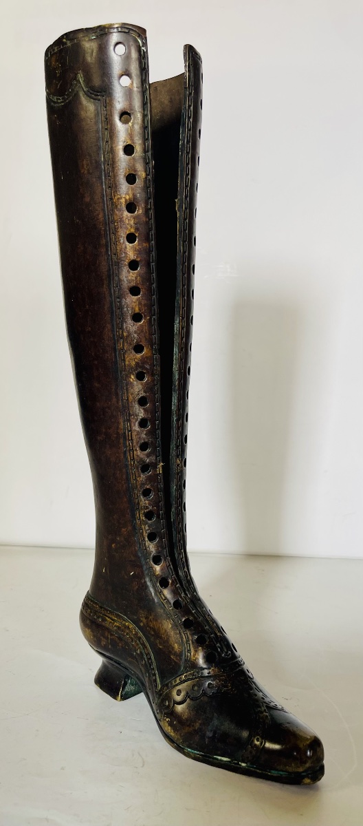Botte en bronze - Enseigne de magasin